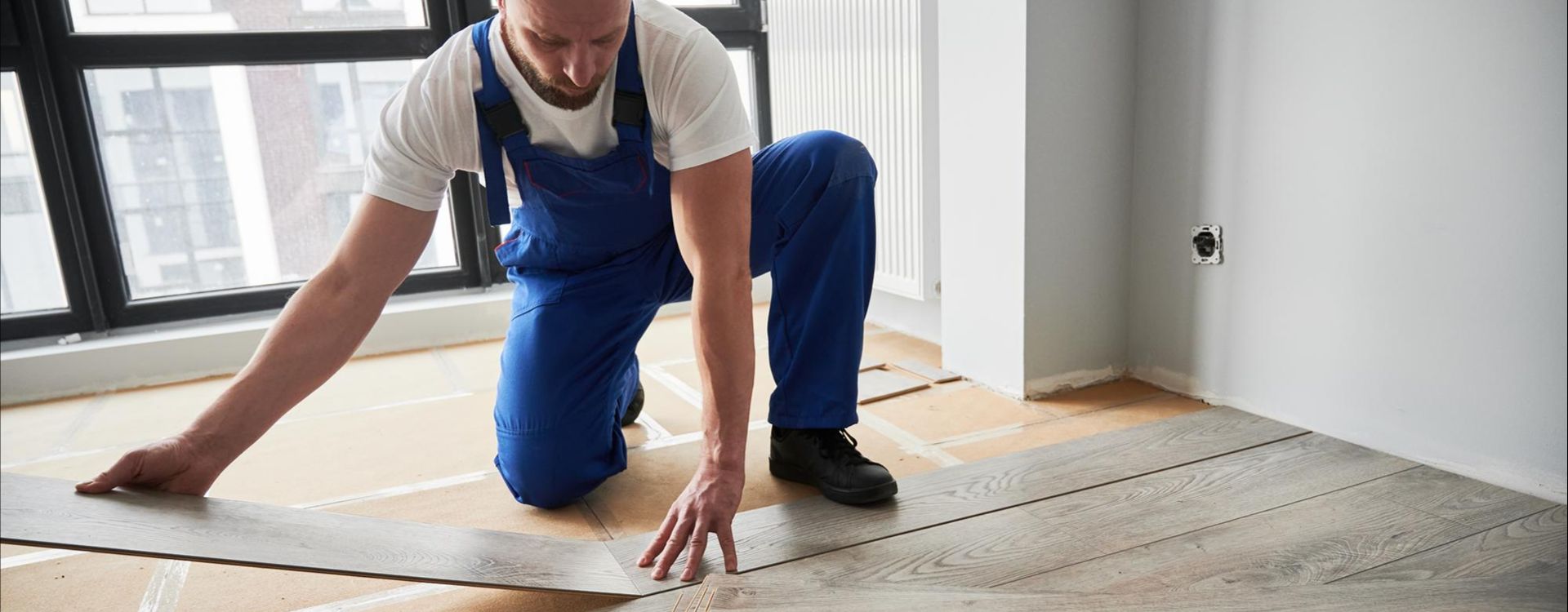 Flooring installation crew laying new floors in Austell GA